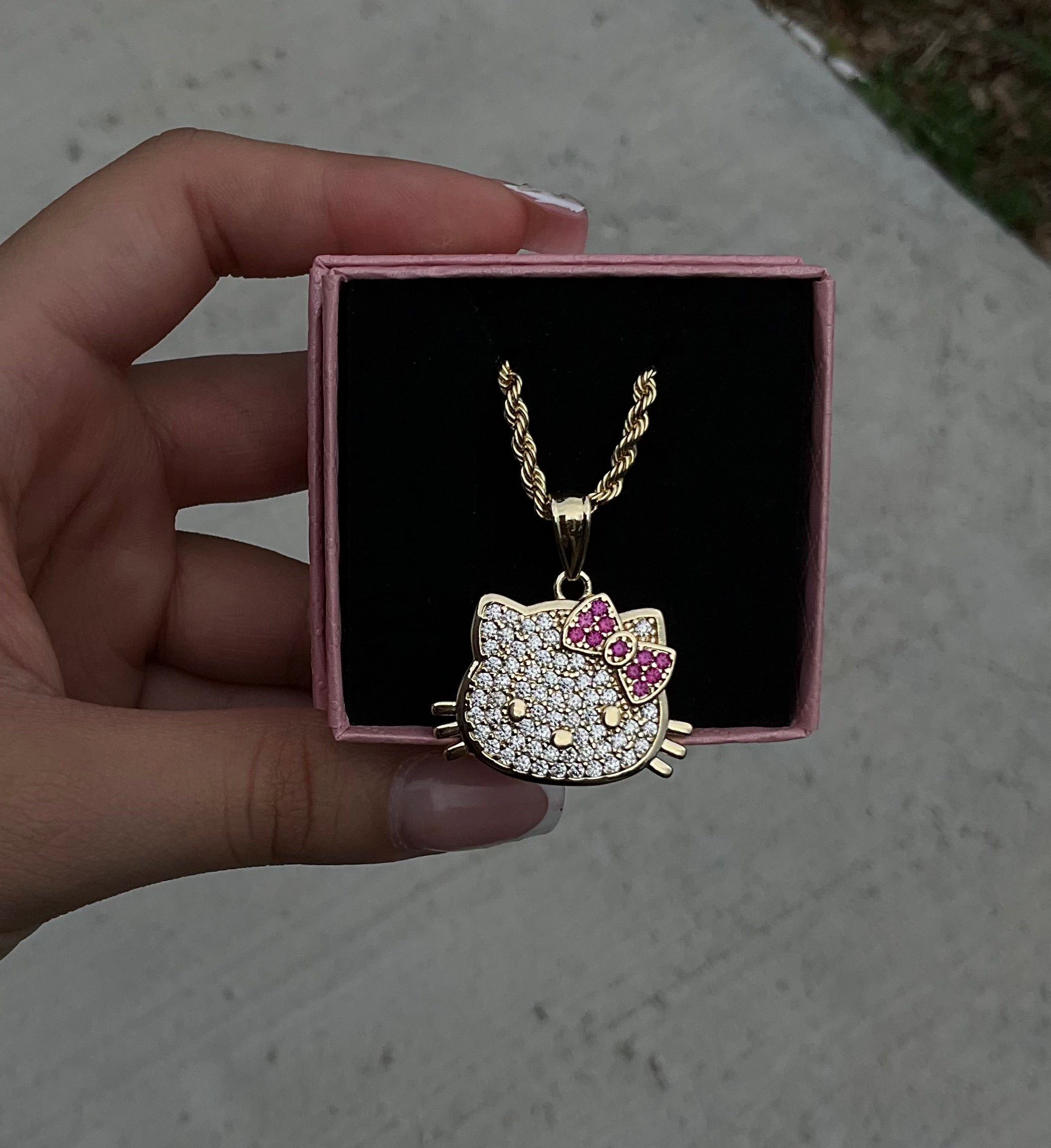 HK iced face necklace