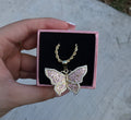 Pink butterfly necklace